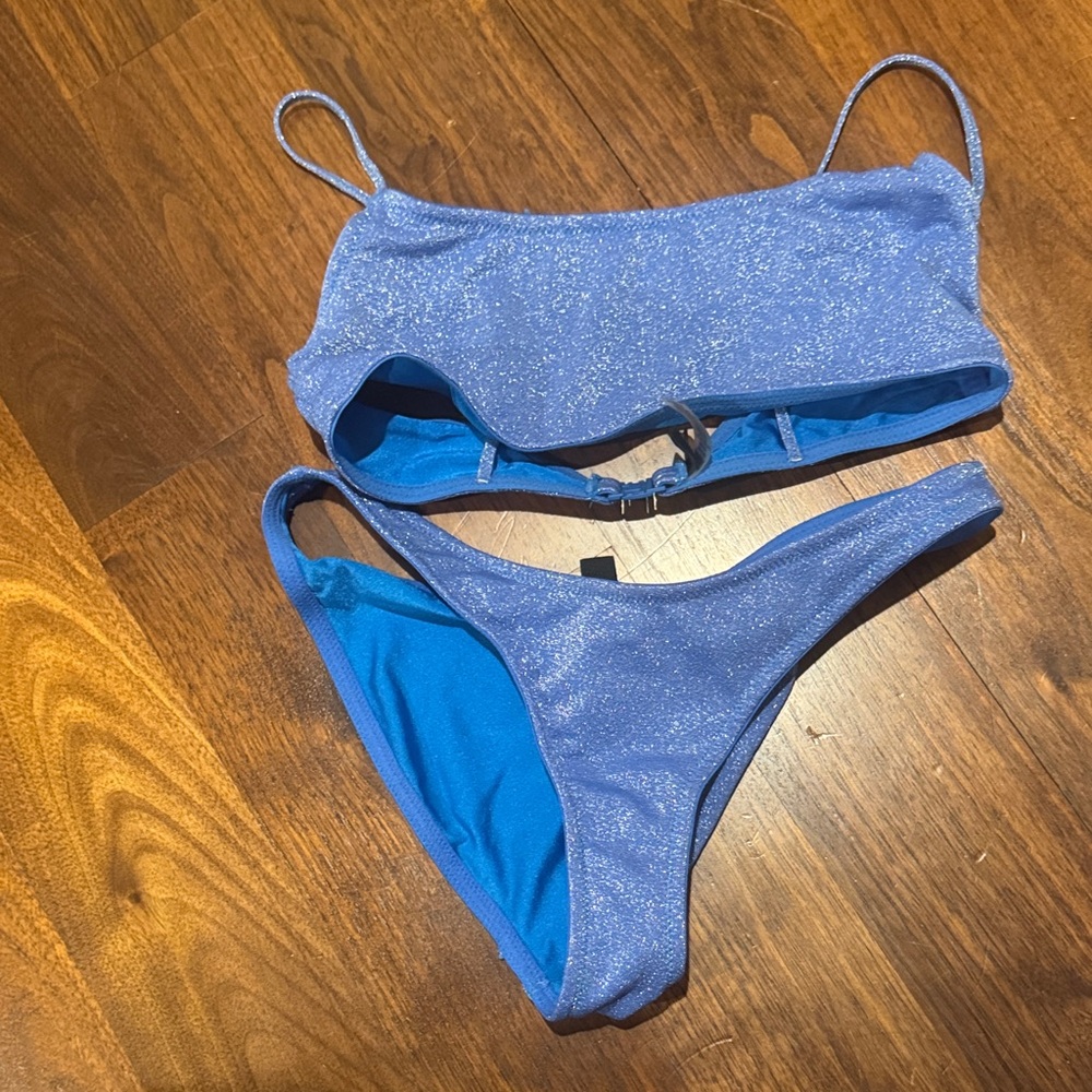 I will trade for it, but I’m also selling it. Cute blue sparkly swimsuit